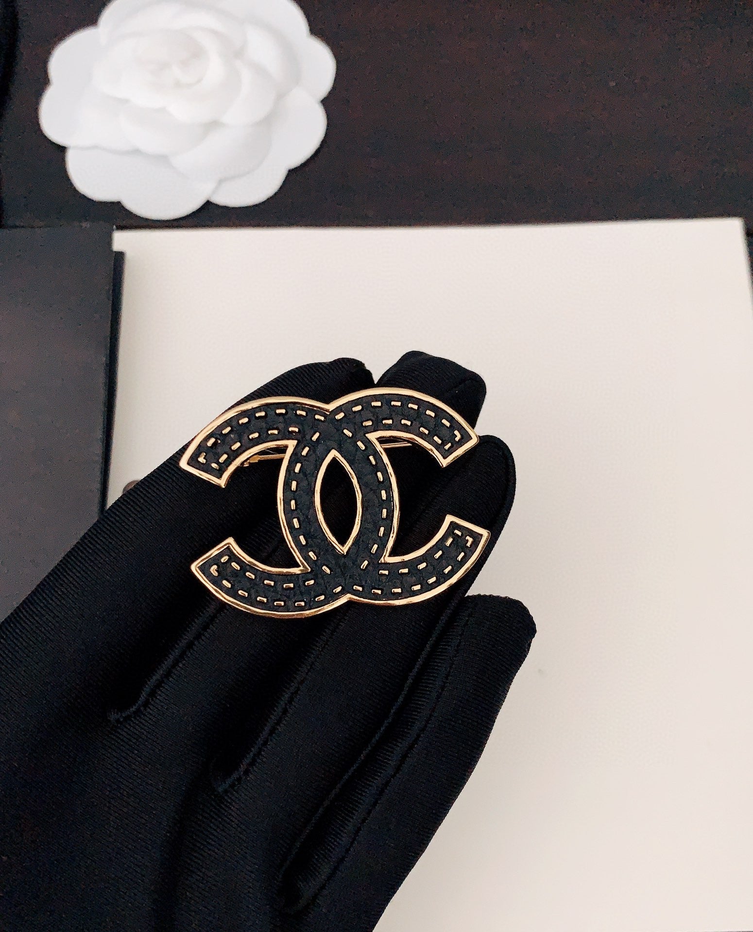 Chanel Black 18K Gold Brooch
